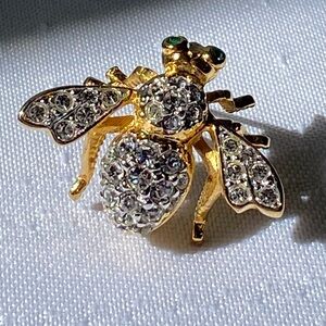 Vintage Joan Rivers Signed Bee Brooch Pin Gold Tone Clear Rhinestone Green Eyes